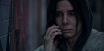 Movie still from “The Unforgivable” (2021), directed by Nora Fingscheidt – A person talking on a cell phone; Close Up shot, Over the shoulder angle