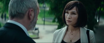 Movie still from “The Vault” (2021), directed by Jaume Balagueró – A man and a woman talking to each other outside; Close Up shot, Over the shoulder angle