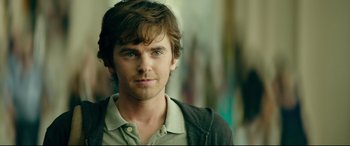 Movie still from “The Vault” (2021), directed by Jaume Balagueró – A person wearing a jacket; Close Up shot, Over the shoulder angle