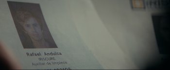 Movie still from “The Vault” (2021), directed by Jaume Balagueró – View of a sheet of white paper; Extreme Close Up shot, Overhead angle