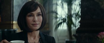 Movie still from “The Vault” (2021), directed by Jaume Balagueró – A person with short hair; Close Up shot, Over the shoulder angle