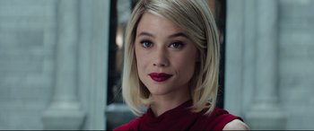 Movie still from “The Vault” (2021), directed by Jaume Balagueró – A person wearing a red shirt; Close Up shot, Over the shoulder angle