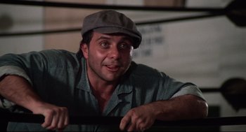 Movie still from “Rocky” (1976), directed by John G. Avildsen – A person wearing a hat; Close Up shot, Low angle