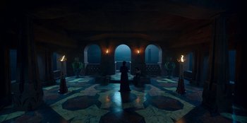 Movie still from “The Witcher” (2019), created by Lauren Schmidt Hissrich – Two people are standing in an empty room; Extreme Wide shot, High angle