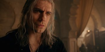 Movie still from “The Witcher” (2019), created by Lauren Schmidt Hissrich – A person with long white hair; Close Up shot, Over the shoulder angle