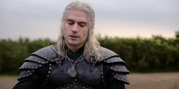 Movie still from “The Witcher” (2019), created by Lauren Schmidt Hissrich – A person wearing a costume; Close Up shot, Over the shoulder angle