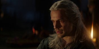 Movie still from “The Witcher” (2019), created by Lauren Schmidt Hissrich – A person with long white hair; Close Up shot, Over the shoulder angle