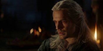 Movie still from “The Witcher” (2019), created by Lauren Schmidt Hissrich – A person with long white hair; Close Up shot, Over the shoulder angle