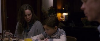 Movie still from “Room” (2015), directed by Lenny Abrahamson – A little girl sitting at a table with her mother; Medium shot, Over the shoulder angle