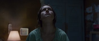 Movie still from “Room” (2015), directed by Lenny Abrahamson – A woman looking up into the sky at night; Close Up shot, Low angle