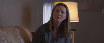 Movie still from “Room” (2015), directed by Lenny Abrahamson – A person sitting in a room; Close Up shot, Over the shoulder angle