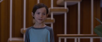 Movie still from “Room” (2015), directed by Lenny Abrahamson – A little girl standing in front of some stairs; Close Up shot, Over the shoulder angle