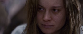 Movie still from “Room” (2015), directed by Lenny Abrahamson – A woman's face with tears coming out of her eyes; Close Up shot, Over the shoulder angle