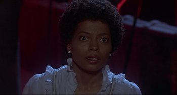 Movie still from “The Wiz” (1978), directed by Sidney Lumet – A person wearing a white shirt; Close Up shot, Low angle