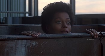Movie still from “The Wiz” (1978), directed by Sidney Lumet – A young woman peeking over the edge of a bathtub; Close Up shot, Low angle