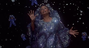 Movie still from “The Wiz” (1978), directed by Sidney Lumet – A woman wearing a blue dress and a blue veil; Medium shot, Low angle