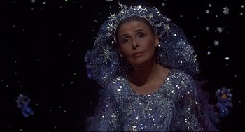 Movie still from “The Wiz” (1978), directed by Sidney Lumet – A woman in a blue dress and a silver veil with stars; Close Up shot, Low angle