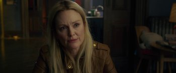 Movie still from “The Woman in the Window” (2021), directed by Joe Wright – A person wearing a jacket; Close Up shot, Over the shoulder angle