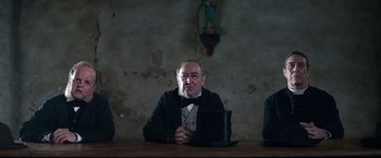 Movie still from “The Wonder” (2022), directed by Sebastián Lelio – Medium shot, Over the shoulder angle