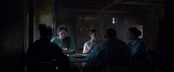 Movie still from “The Wonder” (2022), directed by Sebastián Lelio – Medium shot, Over the shoulder angle