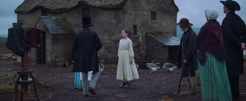 Movie still from “The Wonder” (2022), directed by Sebastián Lelio – Wide shot, Over the shoulder angle