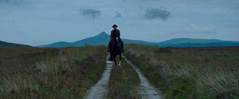 Movie still from “The Wonder” (2022), directed by Sebastián Lelio – Wide shot, Low angle