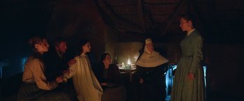 Movie still from “The Wonder” (2022), directed by Sebastián Lelio – Medium shot, Low angle