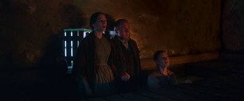 Movie still from “The Wonder” (2022), directed by Sebastián Lelio – Medium shot, Low angle