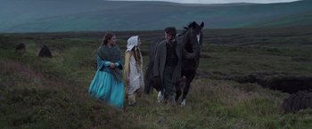 Movie still from “The Wonder” (2022), directed by Sebastián Lelio – Wide shot, Over the shoulder angle