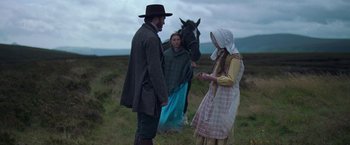 Movie still from “The Wonder” (2022), directed by Sebastián Lelio – Medium shot, Over the shoulder angle