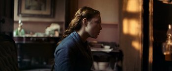 Movie still from “The Wonder” (2022), directed by Sebastián Lelio – Medium shot, Over the shoulder angle