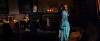 Movie still from “The Wonder” (2022), directed by Sebastián Lelio – Medium shot, Over the shoulder angle