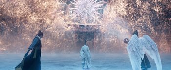 Movie still from “The Yin-Yang Master: Dream of Eternity” (2020), directed by Jingming Guo – A man standing in front of a fireworks display; Extreme Wide shot, Low angle