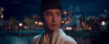 Movie still from “The Yin-Yang Master: Dream of Eternity” (2020), directed by Jingming Guo – A young man in oriental garb looking into the distance; Close Up shot, Low angle
