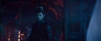 Movie still from “The Yin-Yang Master: Dream of Eternity” (2020), directed by Jingming Guo – A person in a black jacket and a helmet; Medium shot, Over the shoulder angle
