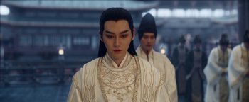 Movie still from “The Yin-Yang Master: Dream of Eternity” (2020), directed by Jingming Guo – A man in a white robe and a man in a black hat; Close Up shot, Over the shoulder angle