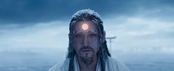 Movie still from “The Yin-Yang Master: Dream of Eternity” (2020), directed by Jingming Guo – A man with long dreadlocks wearing a white shirt; Close Up shot, Low angle