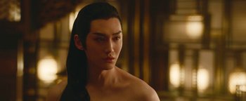 Movie still from “The Yin-Yang Master: Dream of Eternity” (2020), directed by Jingming Guo – A man with long black hair is looking at the camera; Close Up shot, Over the shoulder angle