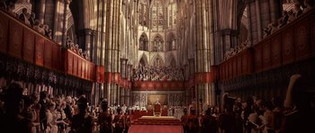 Movie still from “The Young Victoria” (2009), directed by Jean-Marc Vallée – A crowd of people standing in a large cathedral; Extreme Wide shot, High angle