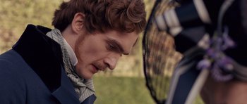 Movie still from “The Young Victoria” (2009), directed by Jean-Marc Vallée – A young man with curly brown hair is looking down at his face; Close Up shot, Over the shoulder angle