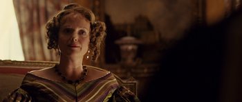 Movie still from “The Young Victoria” (2009), directed by Jean-Marc Vallée – A person wearing a dress; Close Up shot, Over the shoulder angle