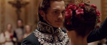 Movie still from “The Young Victoria” (2009), directed by Jean-Marc Vallée – A person wearing a costume; Close Up shot, Over the shoulder angle