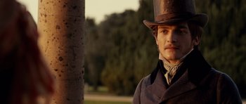 Movie still from “The Young Victoria” (2009), directed by Jean-Marc Vallée – A man wearing a top hat and a long coat; Close Up shot, Low angle