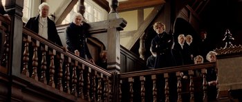 Movie still from “The Young Victoria” (2009), directed by Jean-Marc Vallée – Two men are standing on the stairs of an old building; Wide shot, Low angle