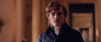 Movie still from “The Young Victoria” (2009), directed by Jean-Marc Vallée – A man with a mustache wearing a blue coat; Close Up shot, Low angle