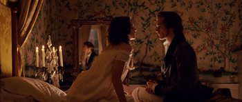 Movie still from “The Young Victoria” (2009), directed by Jean-Marc Vallée – A man and a woman sitting in front of a mirror; Medium shot, Over the shoulder angle