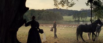 Movie still from “The Young Victoria” (2009), directed by Jean-Marc Vallée – A man and a woman standing in front of a flock of sheep; Wide shot, Over the shoulder angle