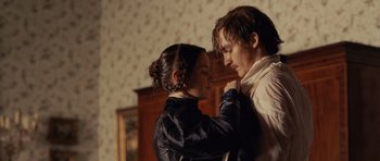 Movie still from “The Young Victoria” (2009), directed by Jean-Marc Vallée – A man and a woman standing next to each other; Medium shot, Low angle