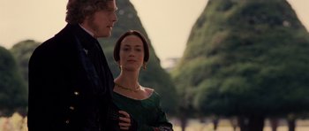 Movie still from “The Young Victoria” (2009), directed by Jean-Marc Vallée – A man and a woman standing next to each other; Medium shot, Over the shoulder angle
