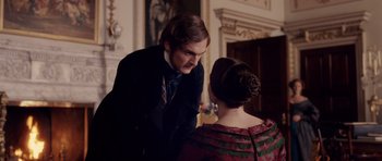 Movie still from “The Young Victoria” (2009), directed by Jean-Marc Vallée – A man and a woman in formal wear talking; Medium shot, Over the shoulder angle